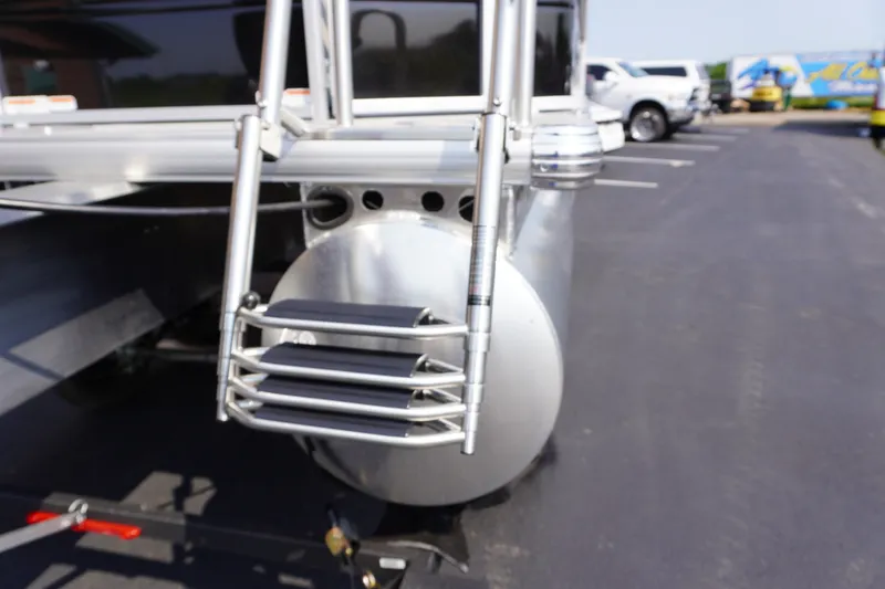 Slide: The Image of Rear view of 2027 Sun Tracker Fishin' Barge 20 DLX pontoon boat ladder. - 16
