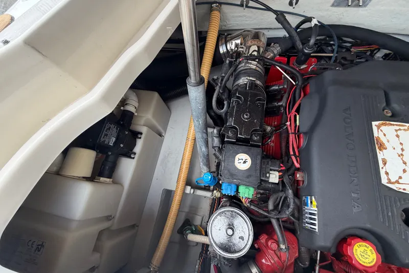 Slide: The Image of Engine compartment of a 2005 Chris-Craft Corsair 25 boat with Volvo Penta engine. - 61