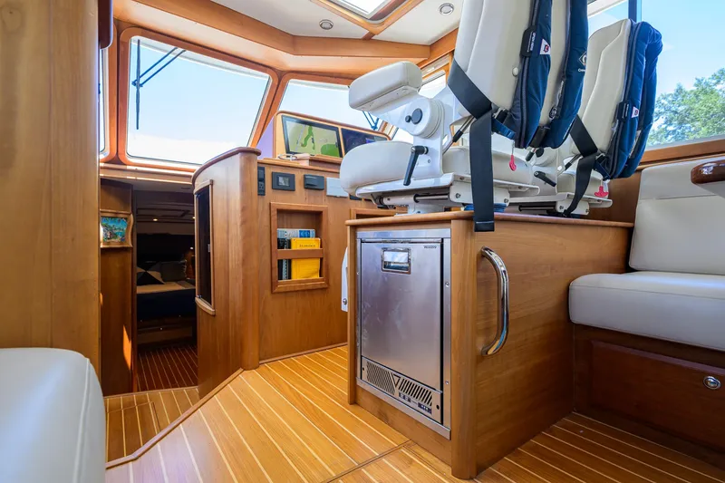 Slide: The Image of Interior of 2018 Sabre 45 Salon Express yacht with luxurious seating and navigation equipment. - 47