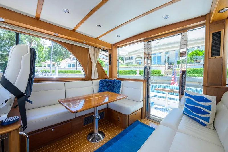 Slide: The Image of Luxurious interior of 2018 Sabre 45 Salon Express yacht with elegant seating and wooden accents. - 29