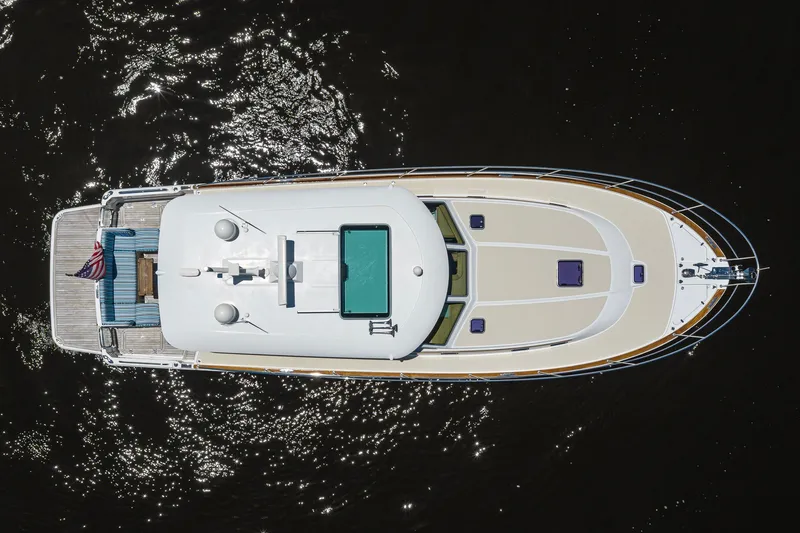 Slide: The Image of Overhead view of 2018 Sabre 45 Salon Express yacht on sparkling water. - 81