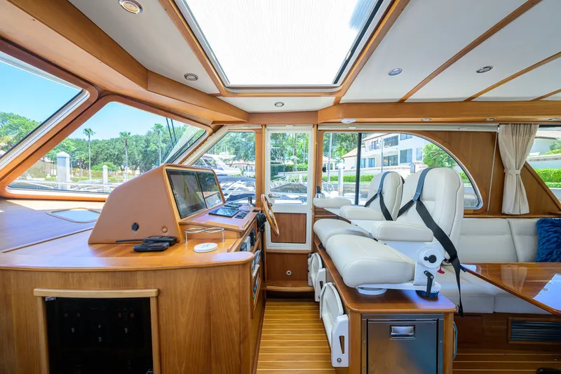 Slide: The Image of Interior of 2018 Sabre 45 Salon Express yacht with luxurious seating and navigation equipment. - 44