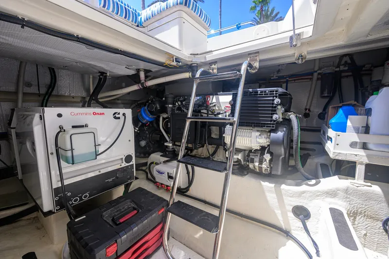 Slide: The Image of Engine room of 2018 Sabre 45 Salon Express with Cummins Onan generator and equipment. - 66
