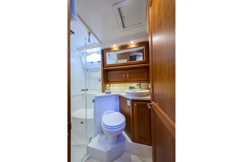 Slide: The Image of Luxurious bathroom interior of 2018 Sabre 45 Salon Express yacht with wooden cabinetry. - 23