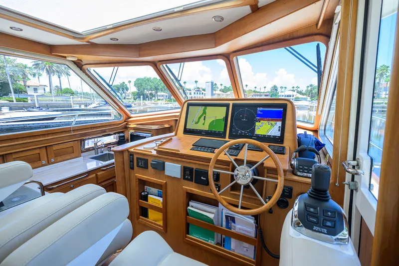 Slide: The Image of Interior of 2018 Sabre 45 Salon Express yacht with modern navigation equipment and luxurious seating. - 39