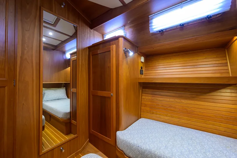 Slide: The Image of Luxurious wooden interior of 2018 Sabre 45 Salon Express yacht cabin. - 19