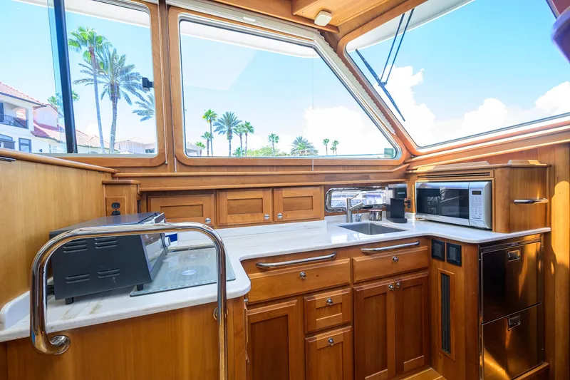 Slide: The Image of Luxurious interior of 2018 Sabre 45 Salon Express yacht with modern kitchen amenities. - 26