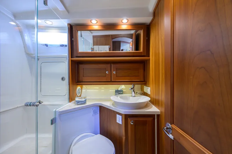Slide: The Image of Luxurious bathroom interior of 2018 Sabre 45 Salon Express yacht with wooden cabinetry. - 21