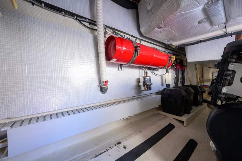 Slide: The Image of Engine room of 2018 Sabre 45 Salon Express yacht, featuring equipment and storage. - 69