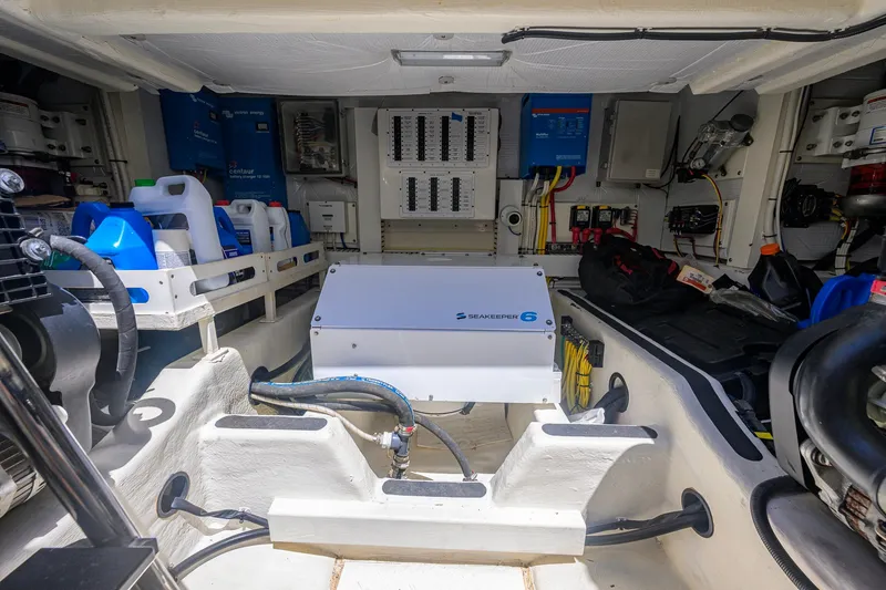 Slide: The Image of Engine room of 2018 Sabre 45 Salon Express with Seakeeper 6 stabilizer system. - 61