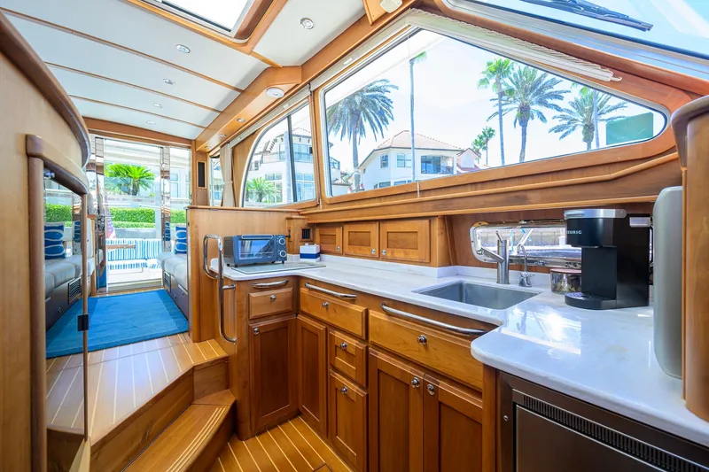 Slide: The Image of Luxurious interior of 2018 Sabre 45 Salon Express yacht with wooden cabinetry and modern amenities. - 25