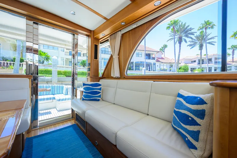 Slide: The Image of Luxurious interior of 2018 Sabre 45 Salon Express yacht with elegant seating and ocean-themed decor. - 34
