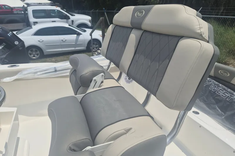 Slide: The Image of 2026 Key West 203 FS boat seating with gray and beige upholstery. - 8