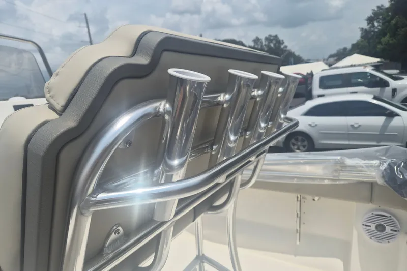 Slide: The Image of 2026 Key West 203 FS boat with rod holders and cushioned seating. - 7