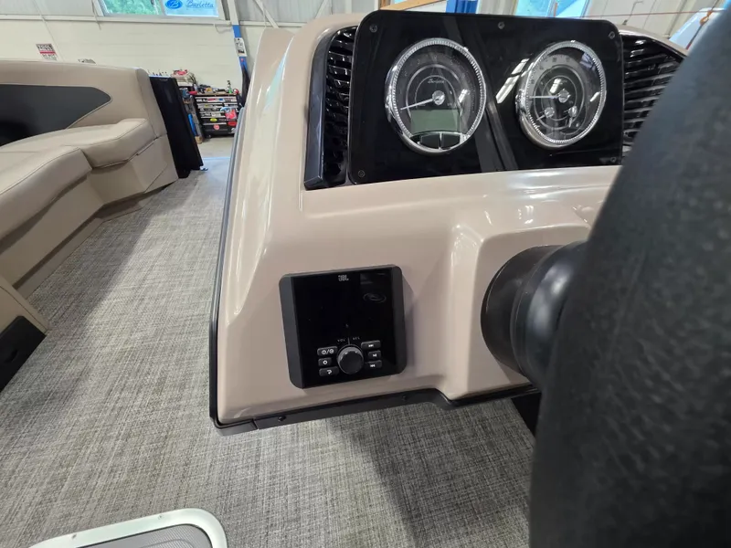 Slide: The Image of The image shows the dashboard of a 2027 Barletta ARIA 22UC with modern instruments. - 18