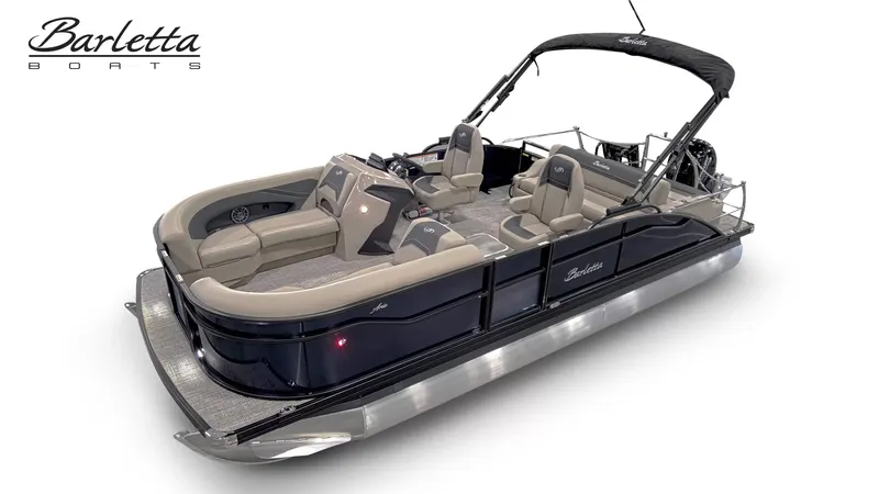 Slide: The Image of The image shows a sleek pontoon boat with beige seating and a black canopy. - 26