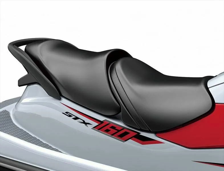 Slide: The Image of Close-up of a Kawasaki JET SKI STX 160 seat with black padding and red accent. - 6