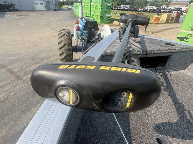 Slide: The Image of A 2014 Crestliner 1850 Fish Hawk with a Minn Kota motor on a trailer. - 9