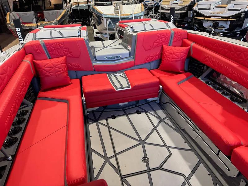 Slide: The Image of The image shows the interior of a Nautique Super Air Nautique G25 Paragon with red upholstery and modern details. - 18