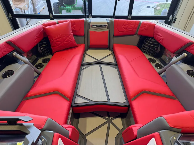Slide: The Image of Interior of a Nautique Super Air Nautique G25 Paragon with red upholstery and modern details. - 19