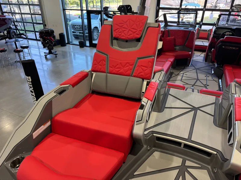 Slide: The Image of Luxurious interior of a 2027 Nautique Super Air Nautique G25 Paragon with red and gray upholstery. - 14