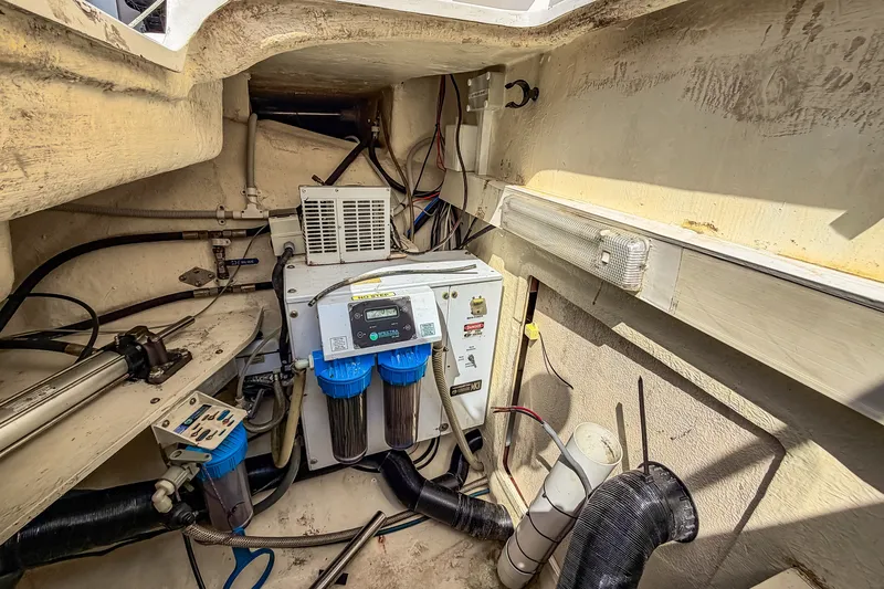 Slide: The Image of Engine room of 2010 St Francis SF 50 yacht with filtration system and wiring. - 114