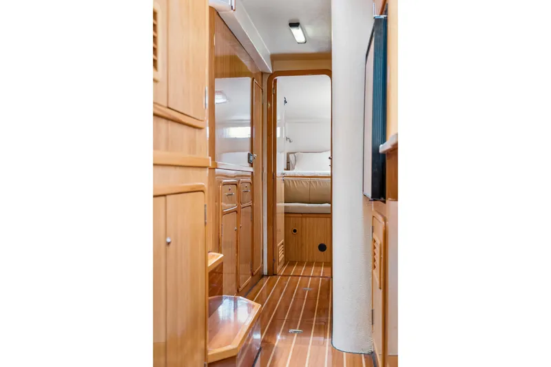 Slide: The Image of Interior of 2010 St Francis SF 50 yacht with wooden cabinetry and cozy bedroom. - 106