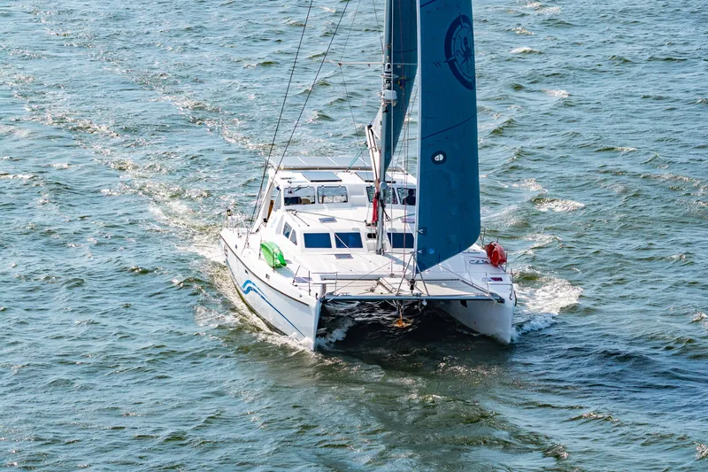 Slide: The Image of Catamaran sailing on open water, St Francis SF 50, 2010 model. - 9