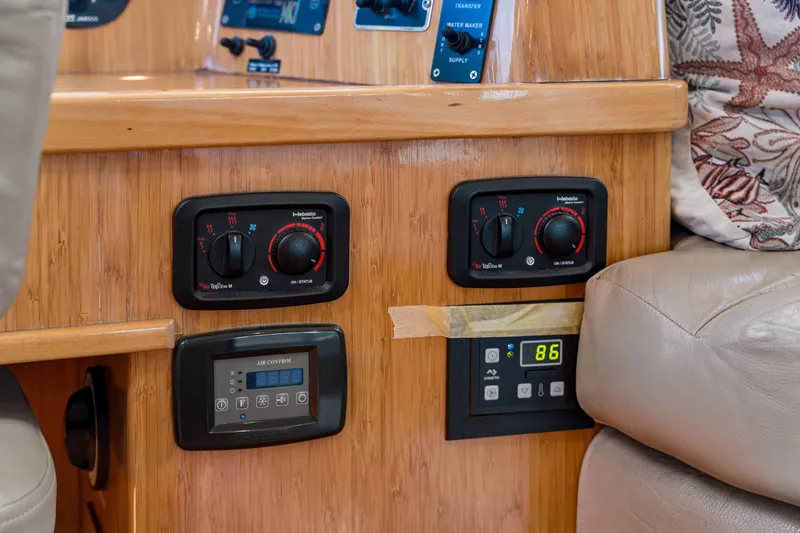 Slide: The Image of Control panel of a 2010 St Francis SF 50 yacht with temperature settings. - 83