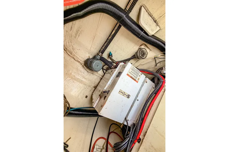 Slide: The Image of Electrical components and wiring inside a 2010 St Francis SF 50 boat. - 108