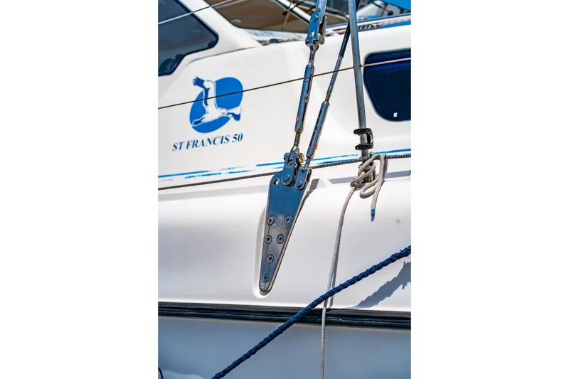 Slide: The Image of Close-up of 2010 St Francis SF 50 yacht with logo and rigging details. - 59