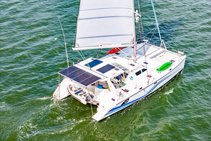 Slide: The Image of Sailing catamaran St Francis SF 50, 2010 model, with solar panels on open water. - 5