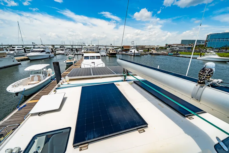 Slide: The Image of St Francis SF 50 yacht with solar panels docked at marina, 2010 model. - 36