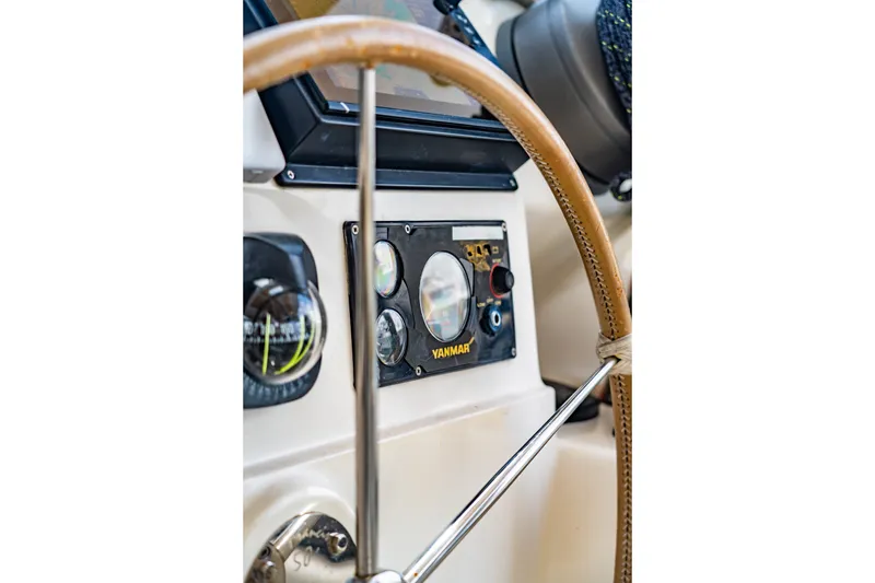 Slide: The Image of Steering wheel and control panel of 2010 St Francis SF 50 yacht. - 52