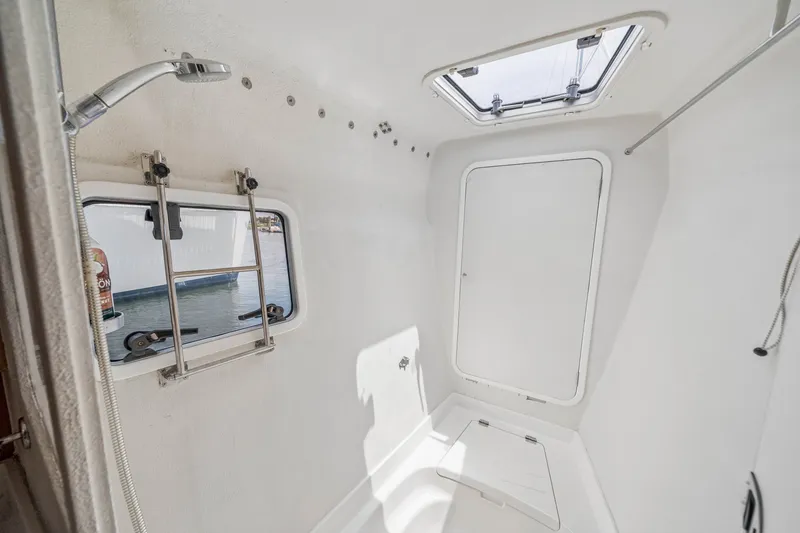 Slide: The Image of Interior of 2010 St Francis SF 50 yacht, featuring a compact, white shower area. - 93