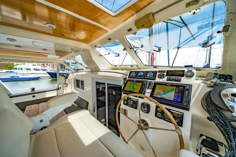 Slide: The Image of Luxurious 2010 St Francis SF 50 yacht interior with navigation equipment and steering wheel. - 54
