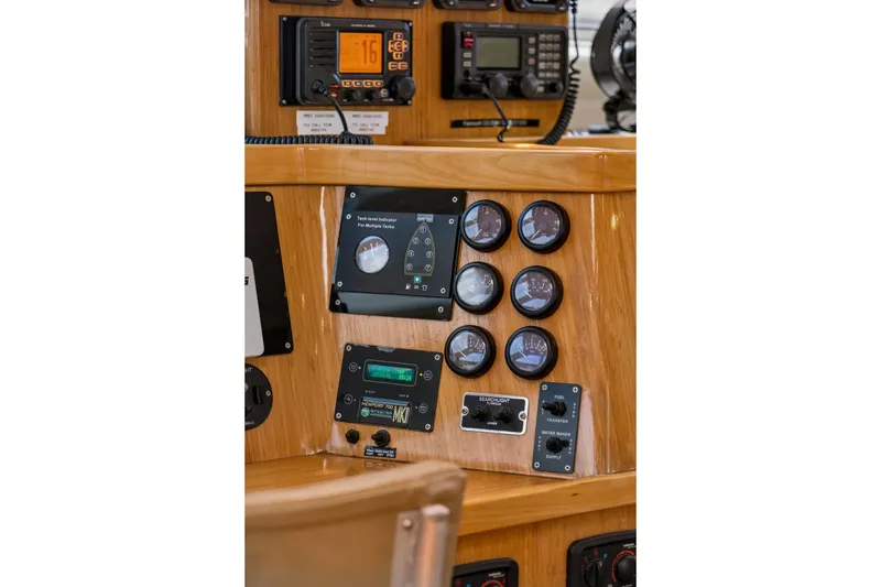 Slide: The Image of Control panel of 2010 St Francis SF 50 yacht with gauges and communication devices. - 82
