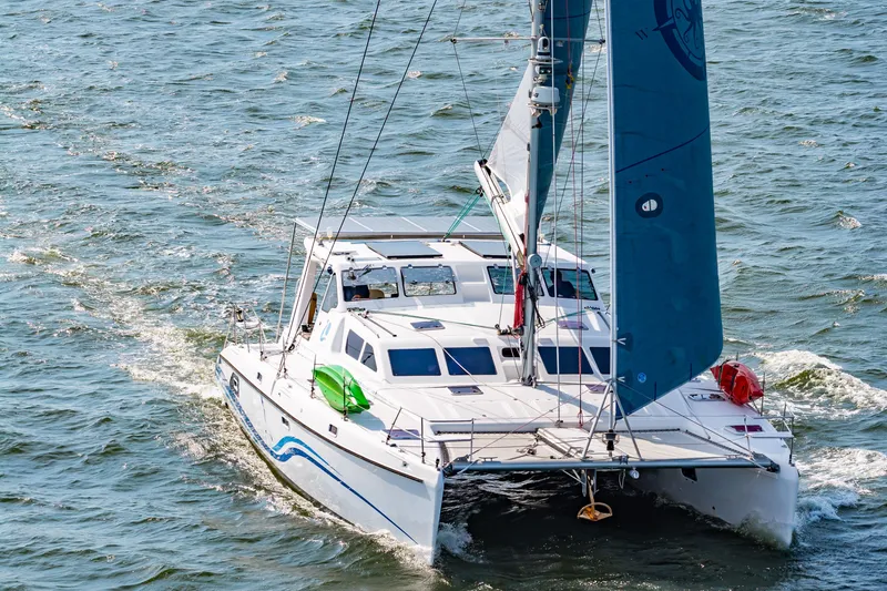 Slide: The Image of Sailing catamaran St Francis SF 50, 2010 model, cruising on open water. - 10