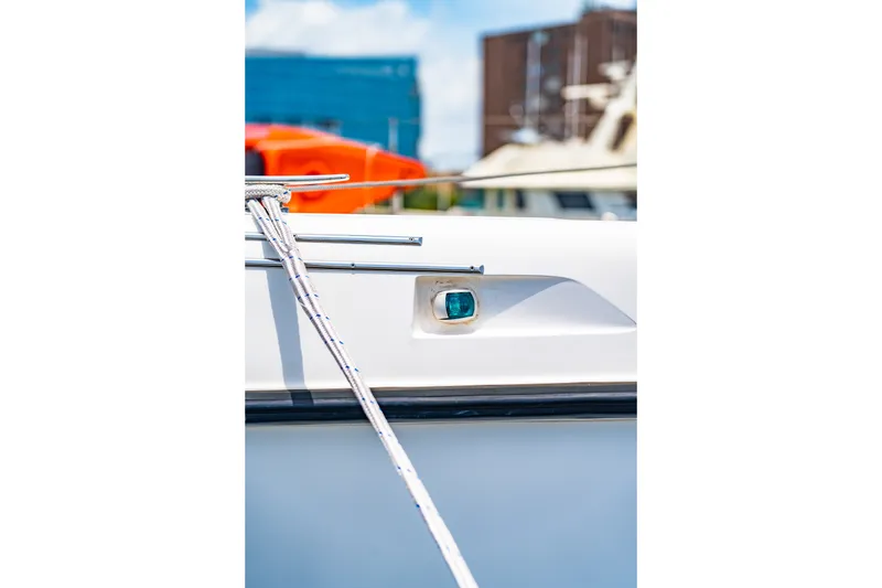 Slide: The Image of Close-up of a 2010 St Francis SF 50 yacht with ropes and a blue window. - 22