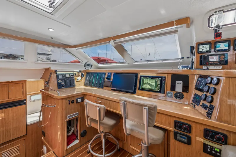 Slide: The Image of Luxurious 2010 St Francis SF 50 yacht interior with advanced navigation equipment and comfortable seating. - 76