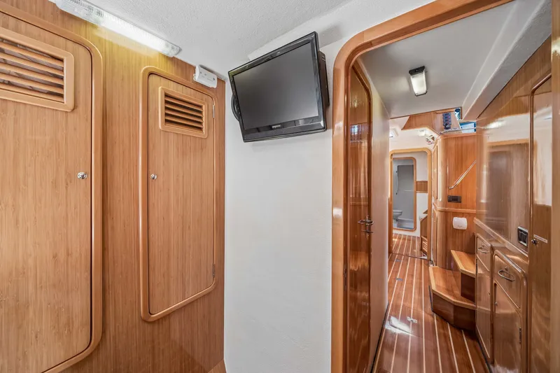 Slide: The Image of Interior of 2010 St Francis SF 50 yacht with wooden paneling and mounted TV. - 104