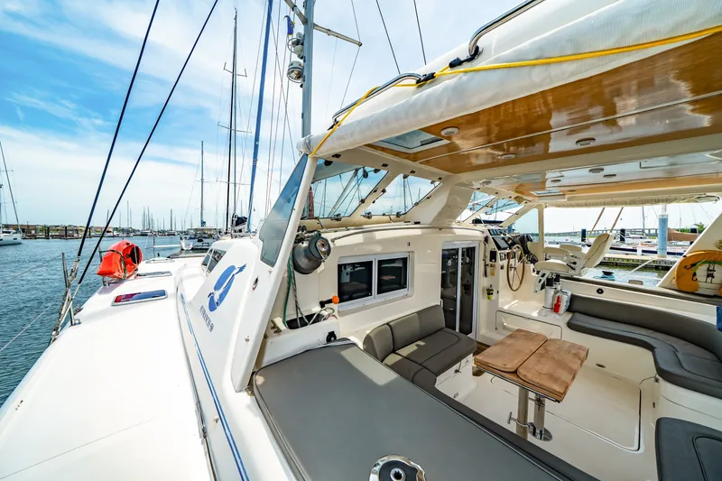 Slide: The Image of Luxurious 2010 St Francis SF 50 yacht interior with seating and helm, docked at marina. - 38