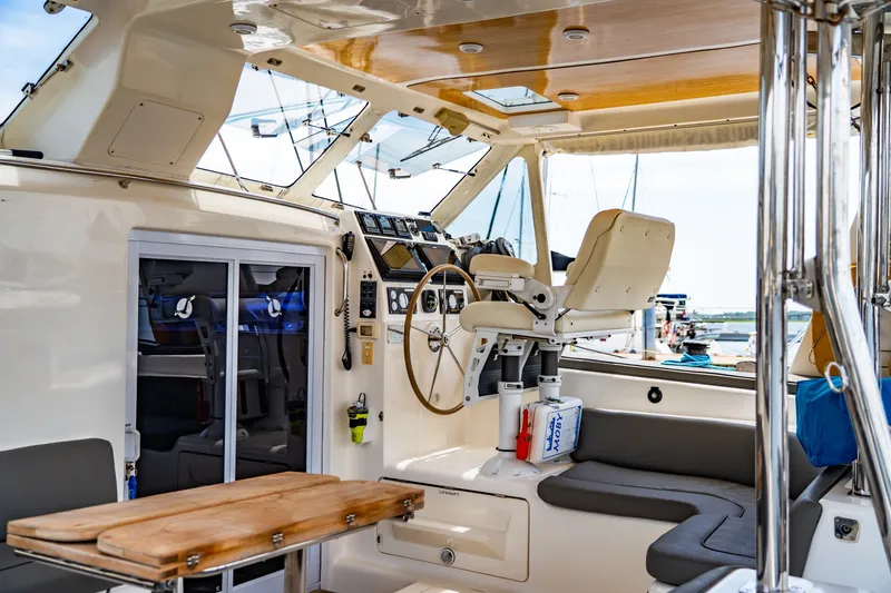Slide: The Image of Interior of 2010 St Francis SF 50 yacht with helm, seating, and navigation equipment. - 46
