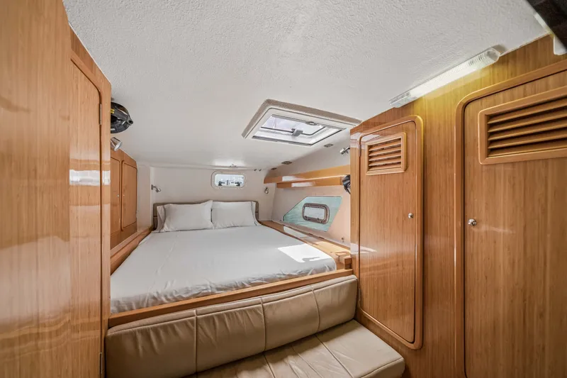 Slide: The Image of Luxurious cabin interior of 2010 St Francis SF 50 yacht with cozy bed and wooden finish. - 103