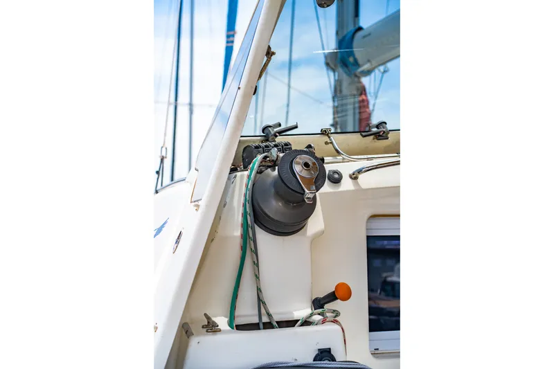 Slide: The Image of Close-up of St Francis SF 50 sailboat cockpit, showcasing winch and rigging, 2010 model. - 43