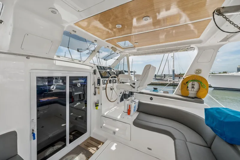 Slide: The Image of Luxurious 2010 St Francis SF 50 yacht interior with helm, seating, and marina view. - 41