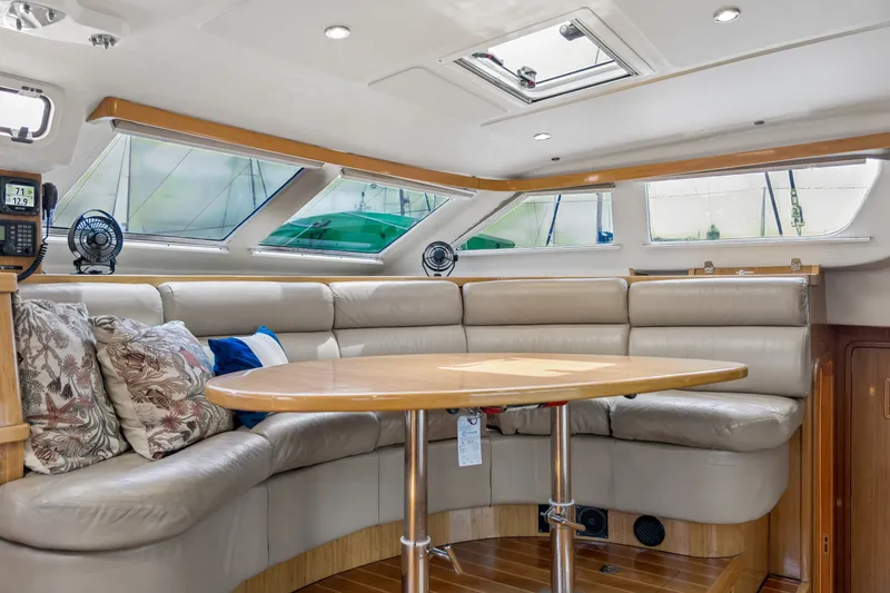 Slide: The Image of Luxurious 2010 St Francis SF 50 yacht interior with plush seating and elegant wooden table. - 70