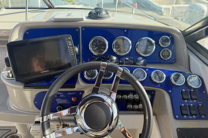 Slide: The Image of Dashboard of a 2003 Formula 330 Sun Sport boat with Garmin navigation system. - 18
