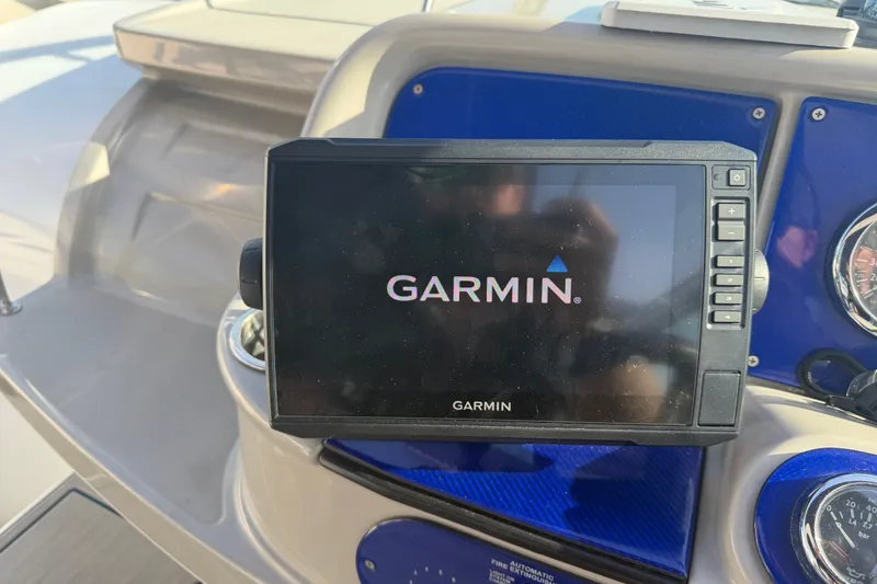 Slide: The Image of Garmin navigation system on 2003 Formula 330 Sun Sport boat dashboard. - 24