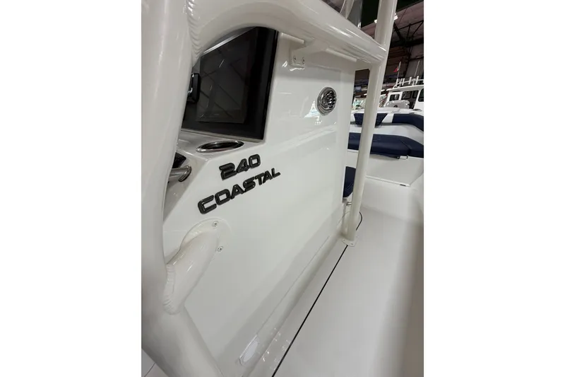 Slide: The Image of 2027 Parker 240 Coastal Elite boat interior, showcasing sleek design and modern features. - 16